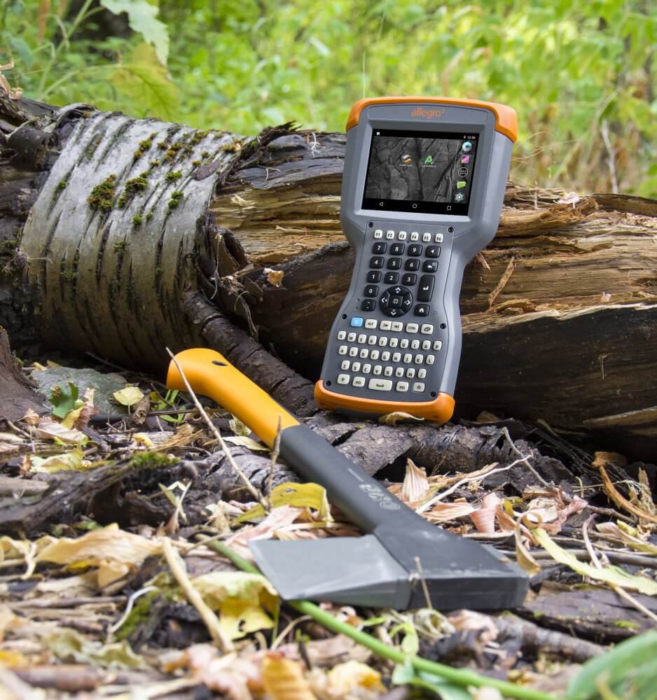 Allegro 3 Rugged Mobile Computer being used in the extreme heat of the forest.