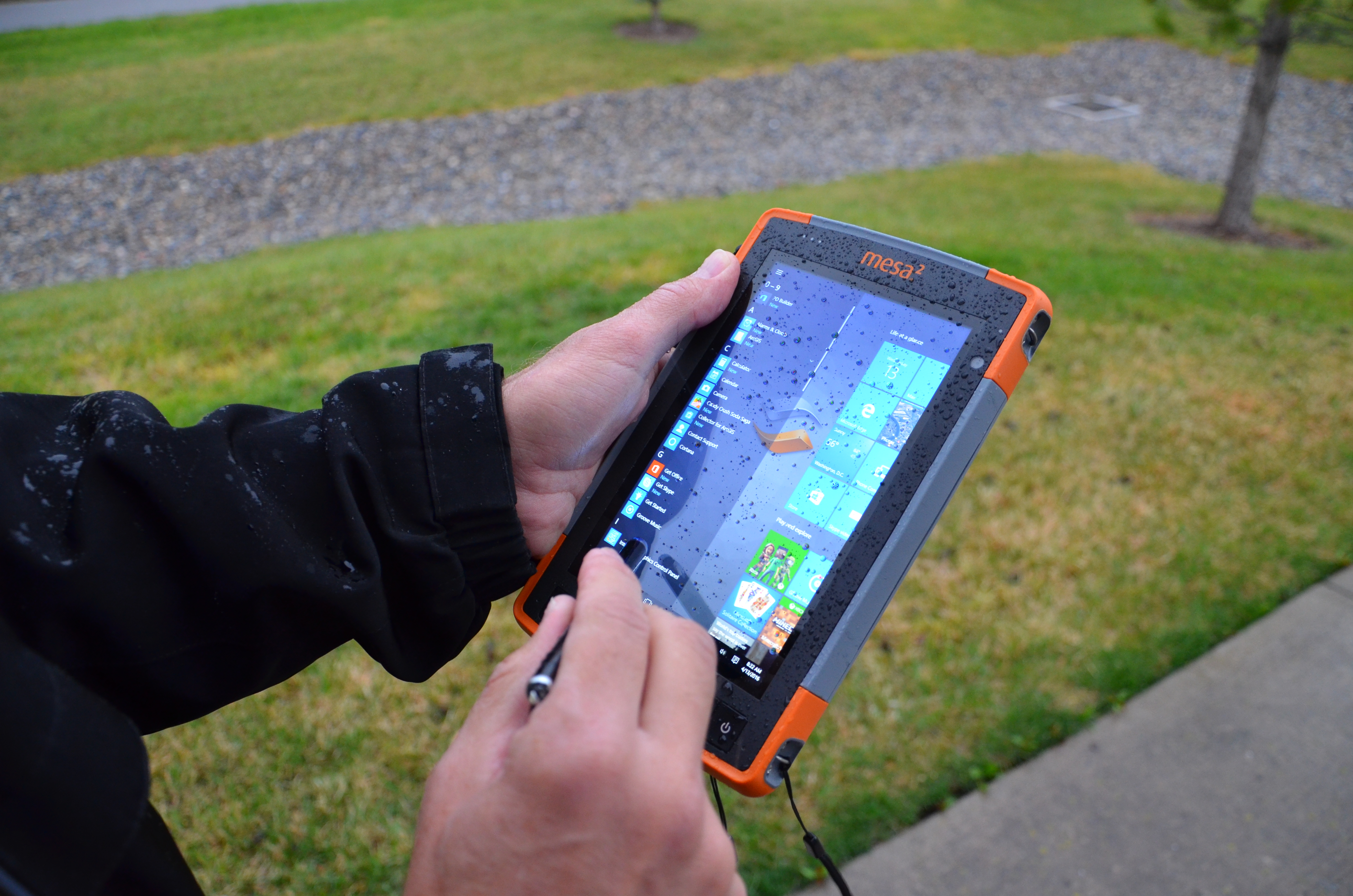 Capacitive touch screen in rain and wet conditions